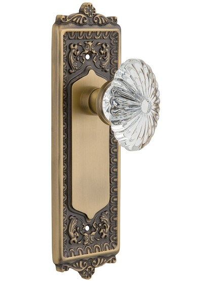 Egg and Dart Plate with Oval Fluted Crystal Knob without Keyhole in Antique Brass with .